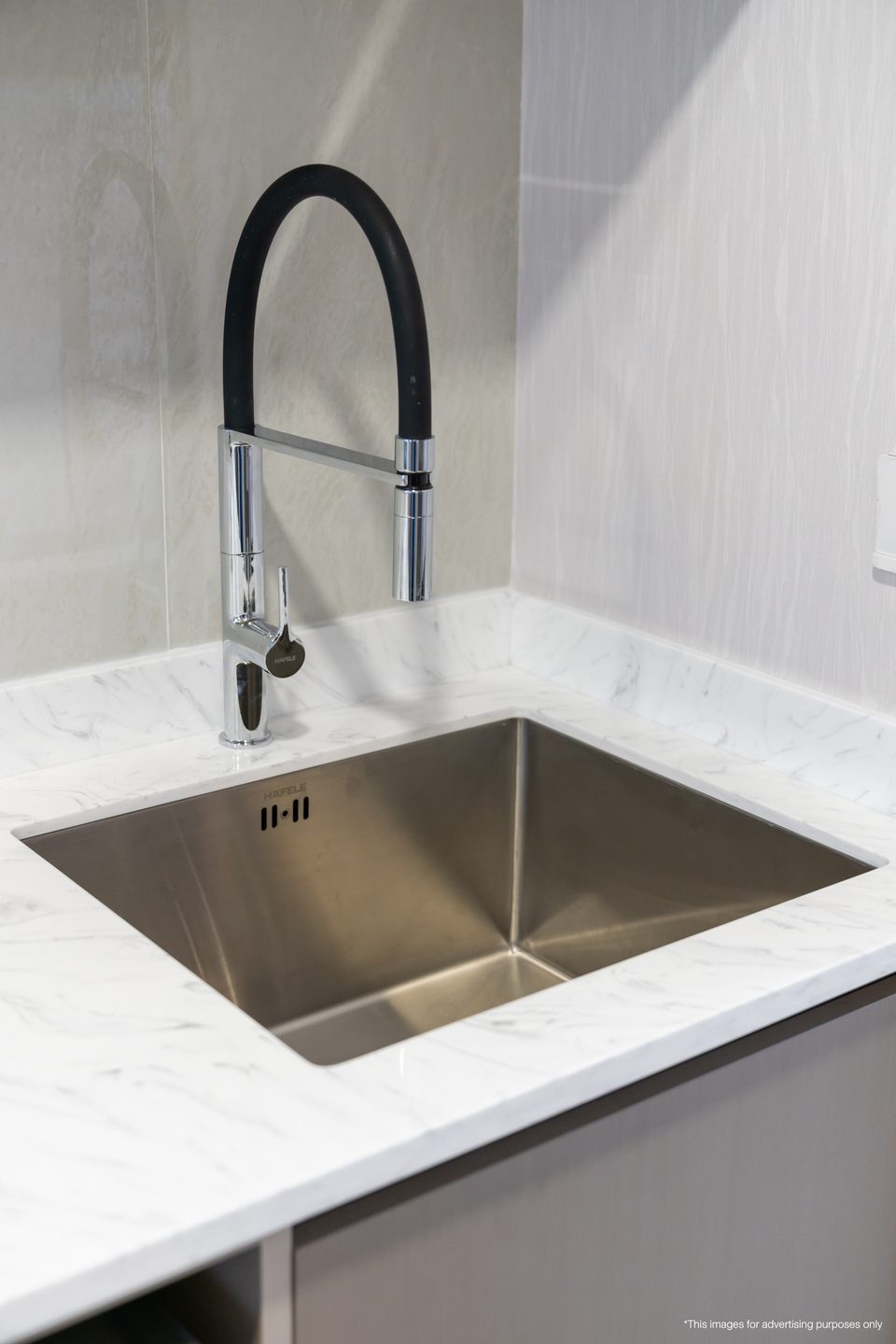 Kitchen sink and tap fitted in the Aquarous 1-Bedroom Deluxe furniture package
